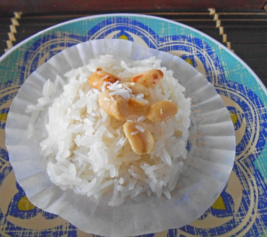 Sticky Rice Steamed in a Cupcake Liner - topped with peanuts
