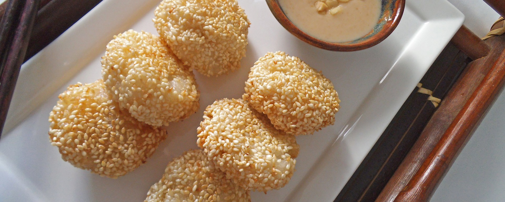 Sticky Rice Cakes with Banana and Sesame Seeds