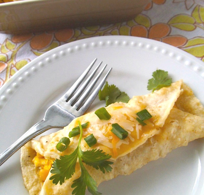 Breakfast Enchilada Casserole | Corn tortillas wrapped around scrambled eggs make a tasty alternative to standard breakfast and brunch fare. And they're gluten free!